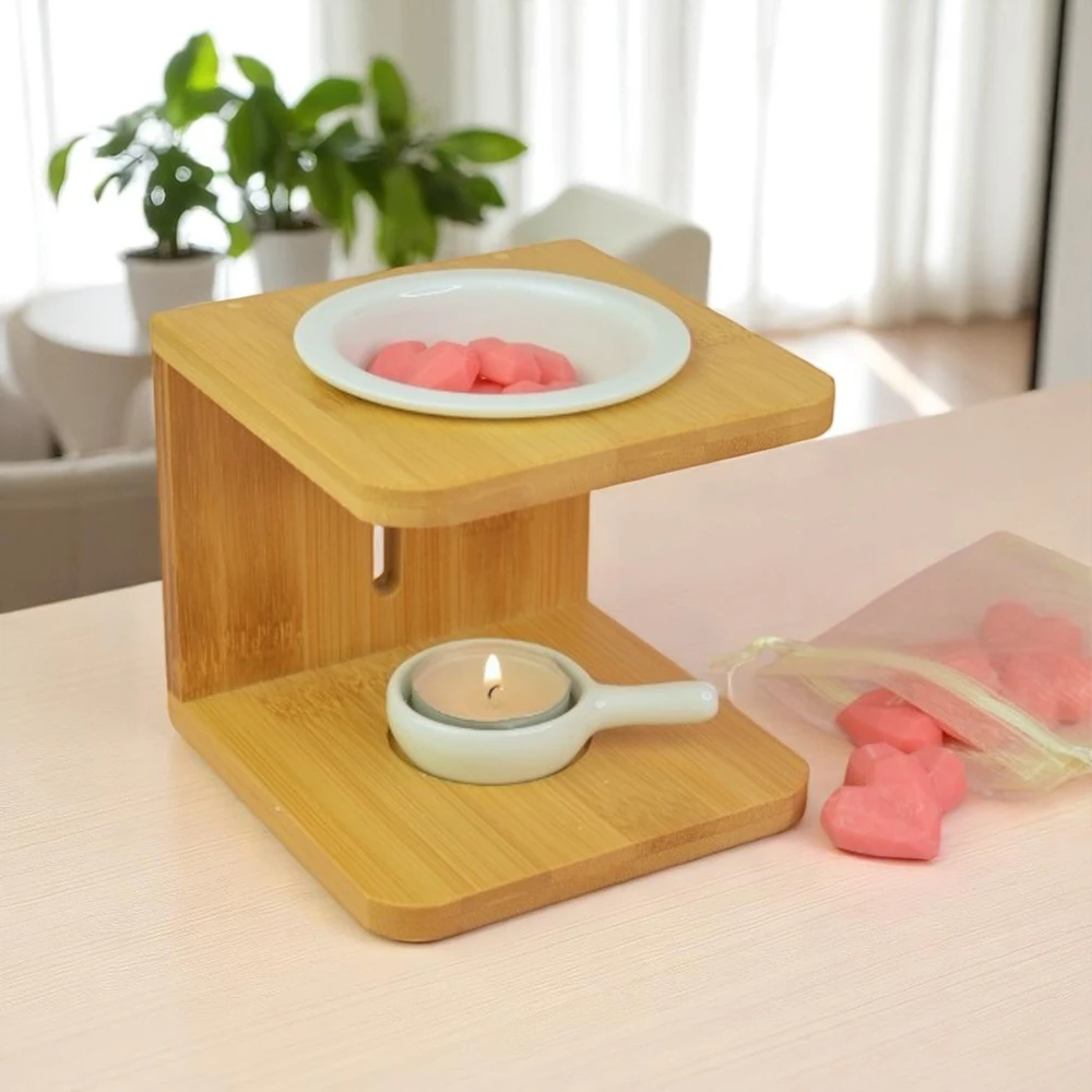 Wax melts σε σχήμα καρδιάς μέσα σε αρωματιστή.
